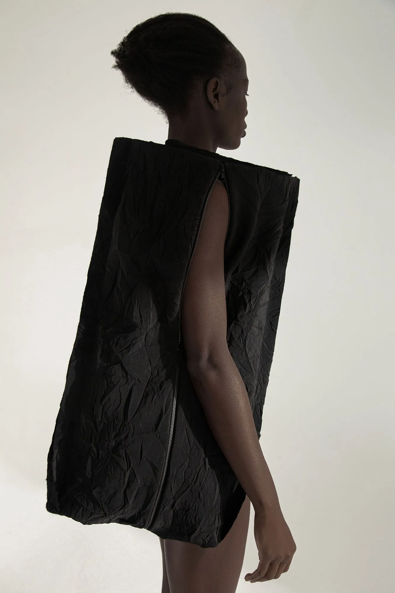 ESCAPE   9-way transforming piece: trousers, jumpsuit, dress, skirt, bag